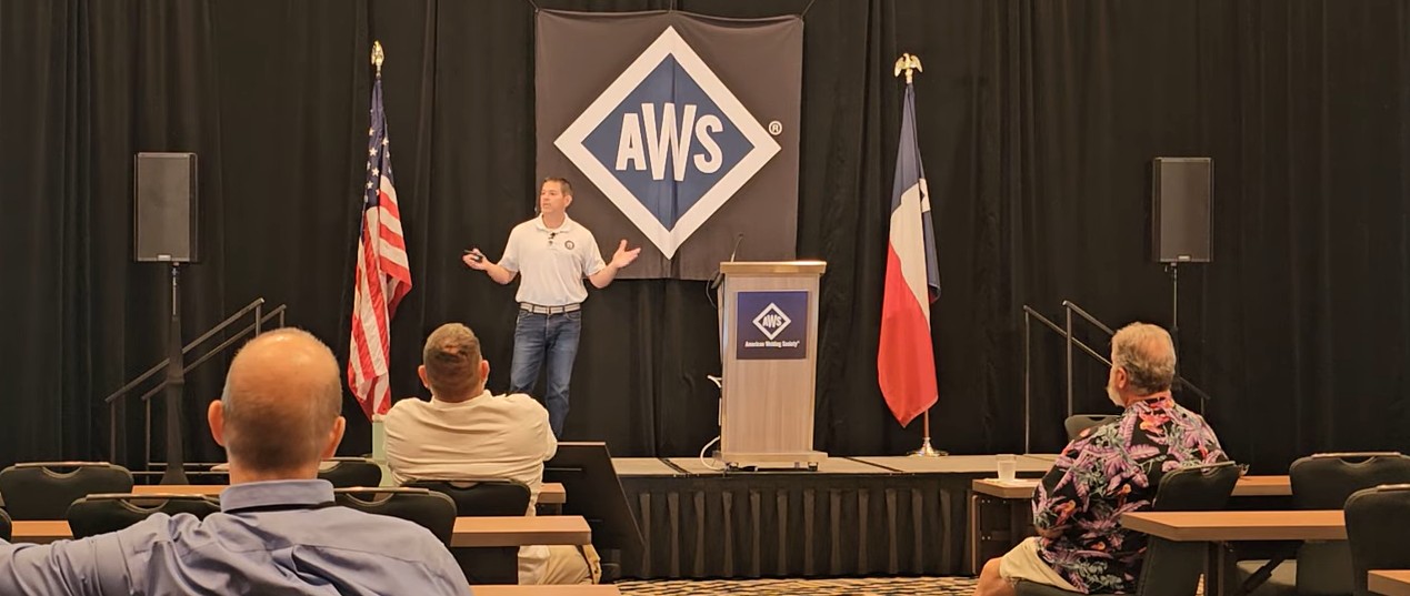 Andrew Brown speaking at the American Welding Society Summit